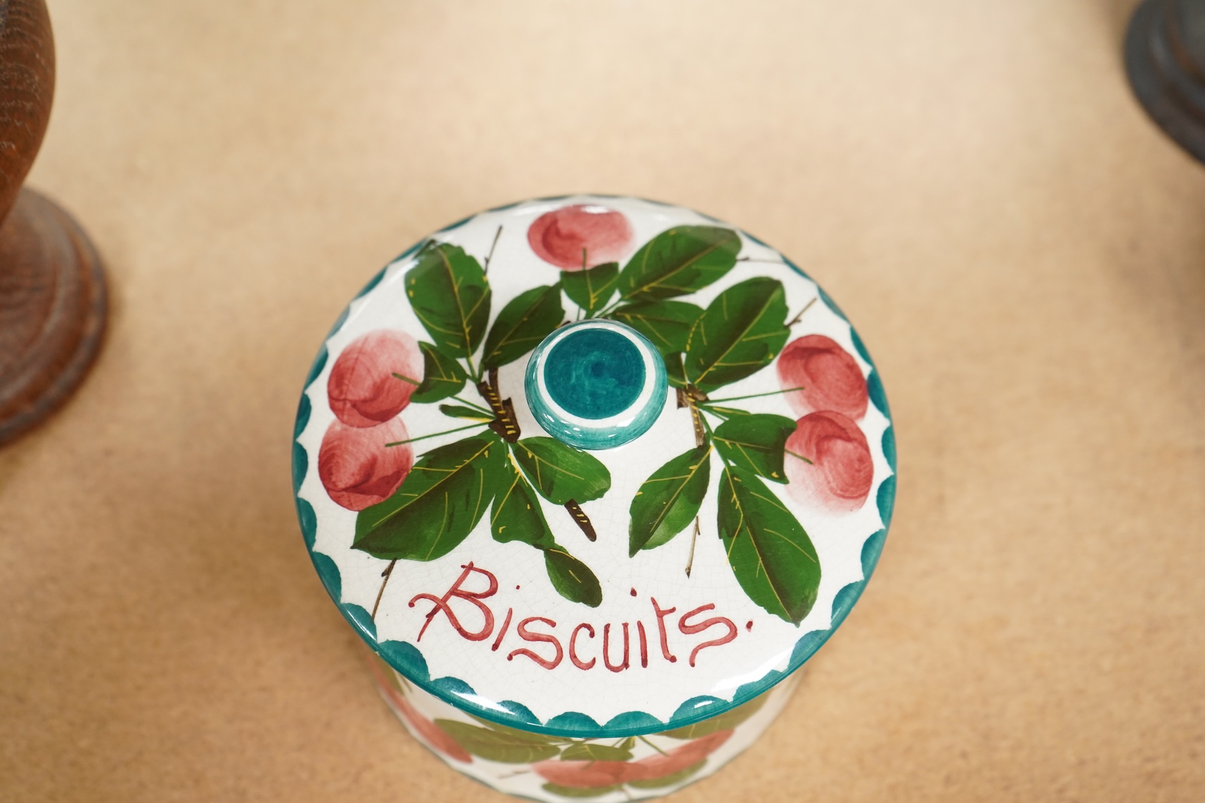 A Wemyss lidded biscuits box, 13cm diameter
